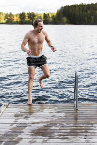 Happy man on jetty