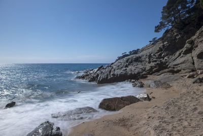 Scenic view of sea against clear sky