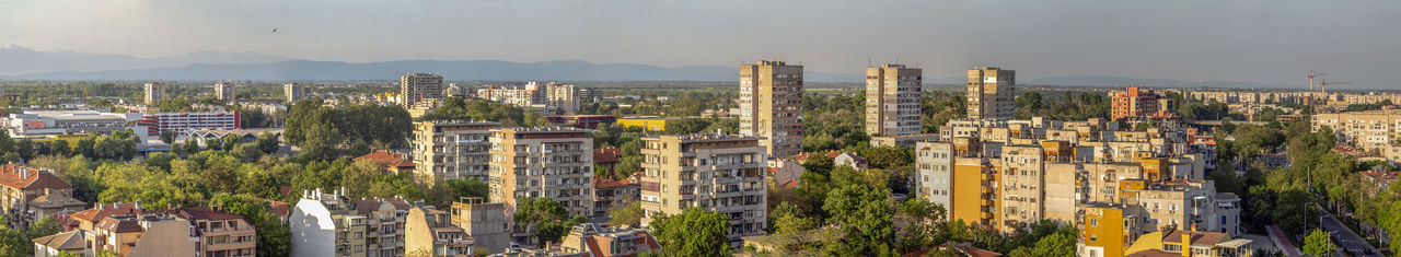 High angle view of buildings in the city against the sky