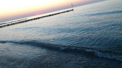 Scenic view of sea at sunset