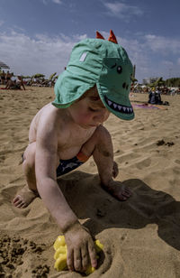 Child playing in sand