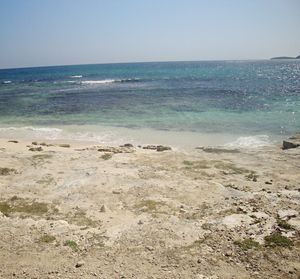 Scenic view of sea against clear sky