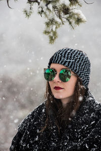 Portrait of woman wearing sunglasses