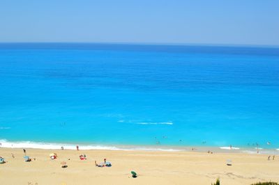 High angle view of tourists on beach