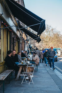 People sitting on chair at table