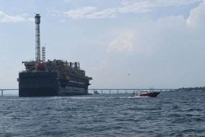 Ship in sea against sky