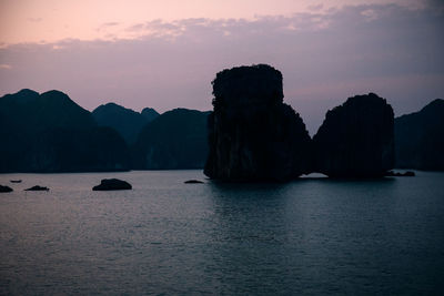 Scenic view of sea against sky at sunset