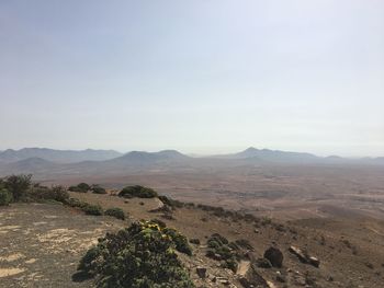 Scenic view of desert against clear sky