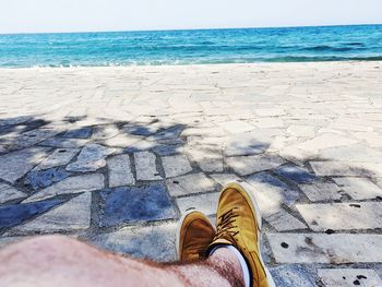 Low section of person on beach