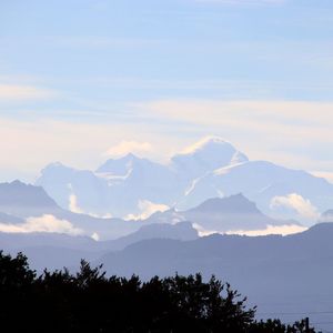 Scenic view of mountains against sky during sunset