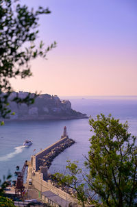 Scenic view of sea against sky at sunset