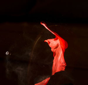 Close-up of water splashing on black background