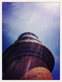 Low angle view of built structure against blue sky