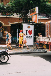 People on street in city