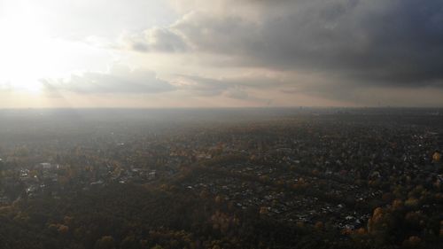 High angle view of city buildings against sky