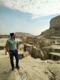 Man standing on rock