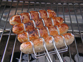 High angle view of meat on barbecue grill