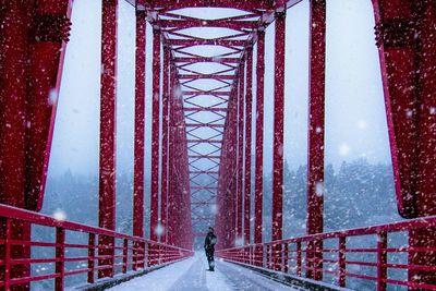 Woman walking on road