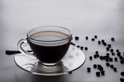 Close-up of coffee cup on table