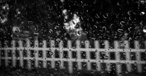 Full frame shot of wet window in rainy season