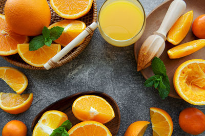 Glass of fresh orange juice with fresh fruits