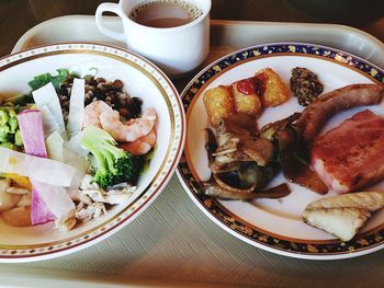 High angle view of breakfast served on table