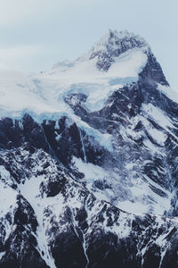 Snowcapped mountains against sky