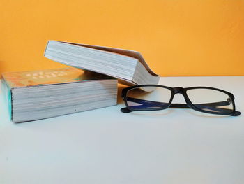 Close-up of eyeglasses on table