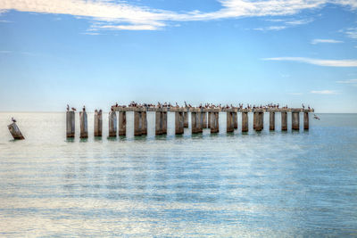 Old abandoned stone fishing pier called bocahenge is l shaped and found in boca grande 