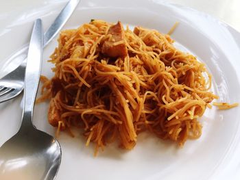 Close-up of noodles in plate on table