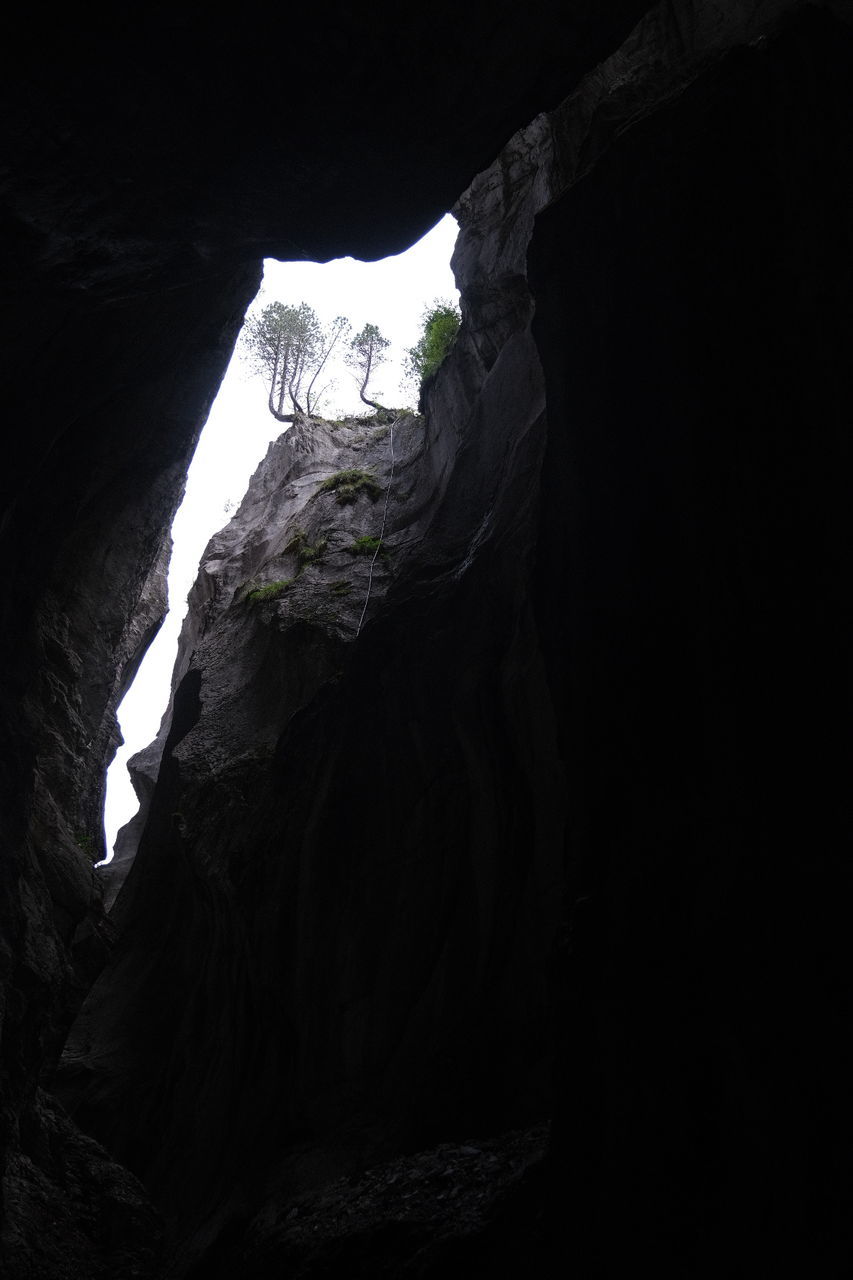 rock - object, rock, rock formation, solid, cave, physical geography, geology, nature, no people, beauty in nature, tranquility, non-urban scene, travel destinations, low angle view, mountain, day, travel, scenics - nature, tranquil scene, outdoors, dark, eroded, formation