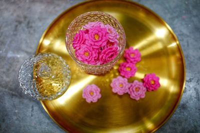 High angle view of pink roses on table