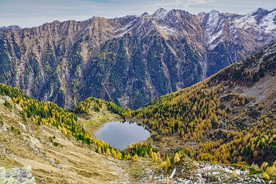 Scenic view of snowcapped mountains against sky