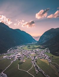 Aerial view of landscape against sky during sunset