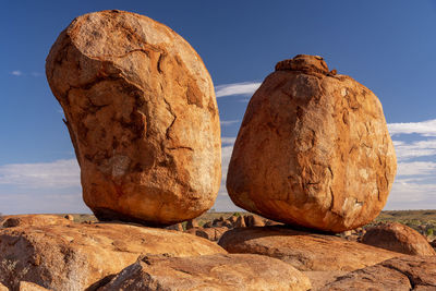 Close-up of rock formation against sky