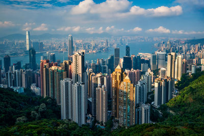 Aerial view of modern buildings in city against sky