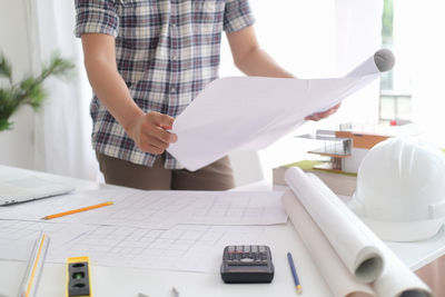 Man working on book