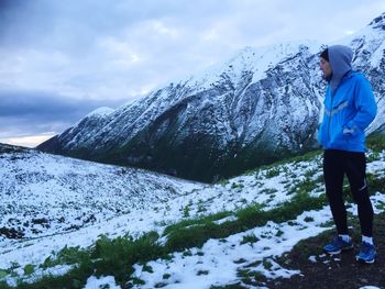 Scenic view of snow covered mountains