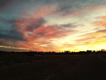 Scenic view of dramatic sky during sunset