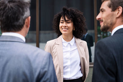 Side view of business colleagues shaking hands