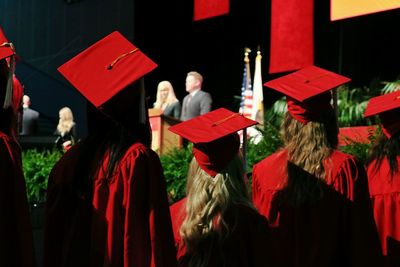 University students walking in queue during graduation ceremony