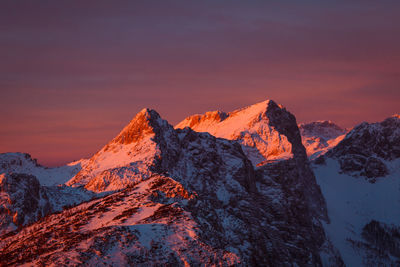 Scenic view of snowcapped mountains against sky during winter