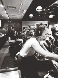 Woman standing in restaurant