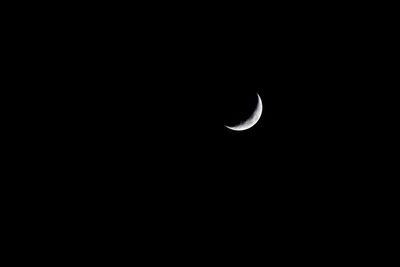 Scenic view of moon against sky at night