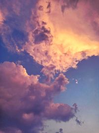 Low angle view of cloudy sky during sunset