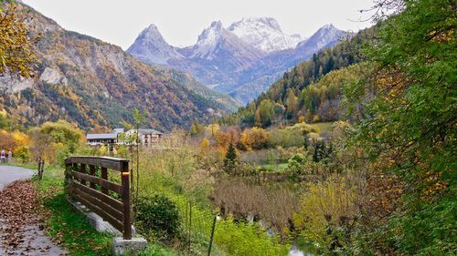 Scenic view of field against mountains during autumn