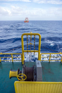 A tugboat towing a construction work barge at offshore terengganu oil field