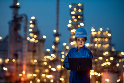 Engineer inspecting in industrial oil refinery. industry 4.0 concept. background blurred concept.