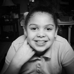 Portrait of smiling girl at home