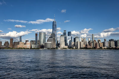 View of buildings in city against sky